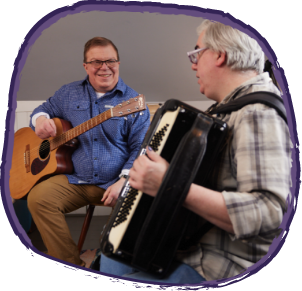 Hunter syndrome patient playing in a band with friends